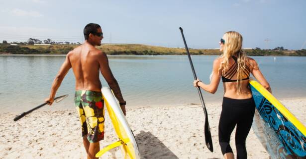 Bautismo de paddle surf en la playa La Mar Bella