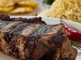 Menú de chuletón o carne a la parrilla para 2 o 4 en Sabor A Fuego